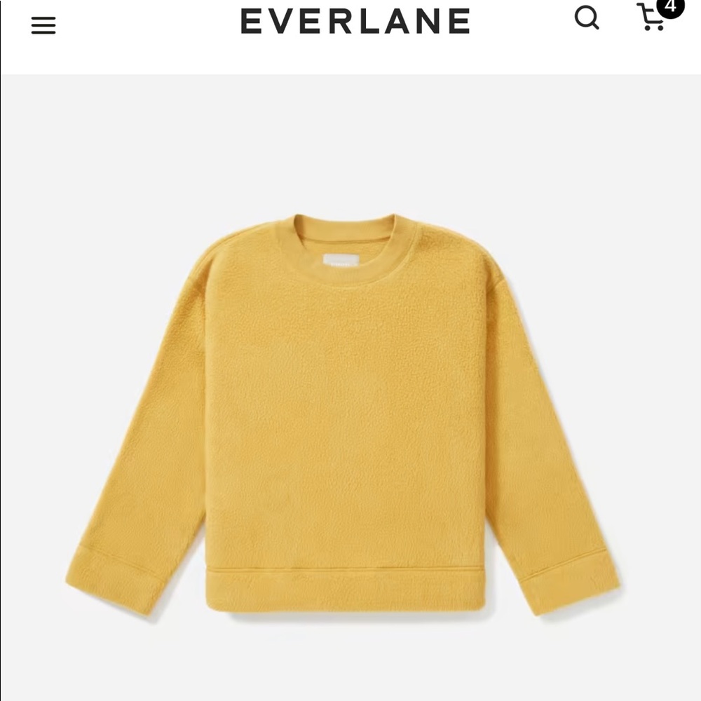 The ReNew Plush Fleece Sweatshirt features a classic crew neckline.